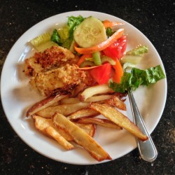 Real food dinner for Food Revolution Day 2013 crunchy garlicky chicken and oven baked potato wedges with salad by Mardi Michels eatlivetravelwrite.com
