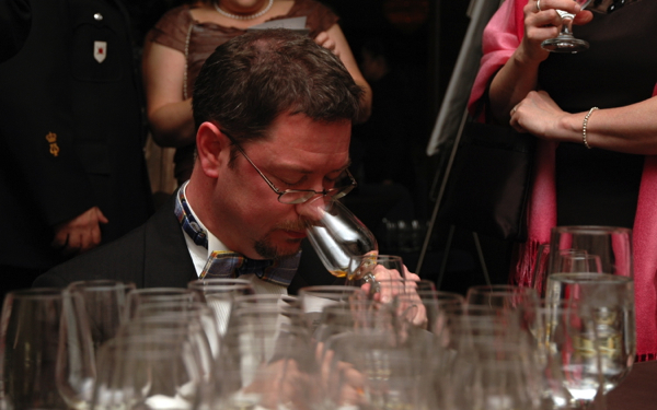 Neil Phillips tasting wine on eatlivetravelwrite.com