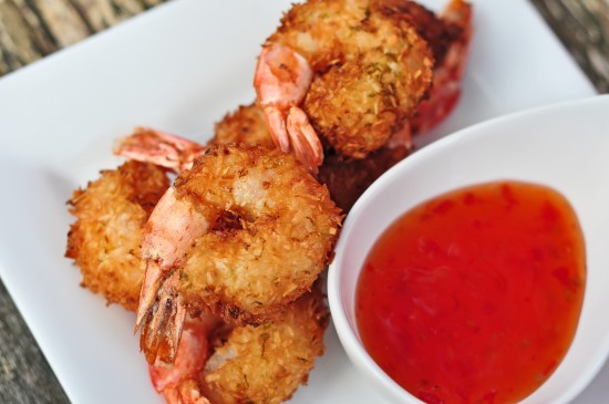 Deep fried coconut lime prawns or shrimp with chili sauce