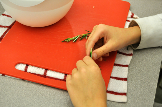 Picking rosemary for Jamie Oliver's risotto