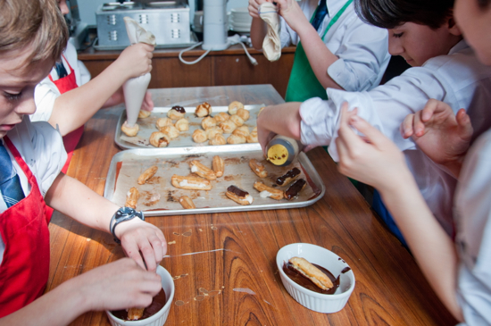 Baking with kids filling eclairs and cream puffs by eat. live. travel. write.