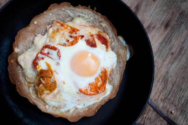 Crispy buckwheat crepe with tomato chicken cheese and egg on eatlivetravelwrite.com