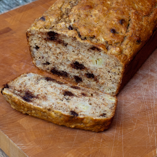 Banana bread loaf with chocolate chips on eatlivetravelwrite.com