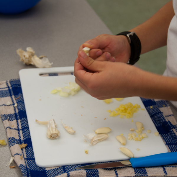 Kids peeling garlic on eatlivetravelwrite.com