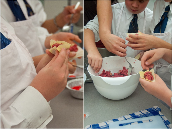 Kids assembling bison siu mai on eatlivetravelwrite.com