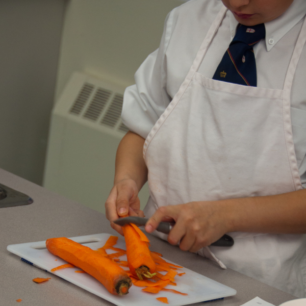 Kids peeling carrots on eatlivetravelwrite.com