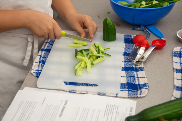 Kids julienning vegetables on eatlivetravelwrite.com