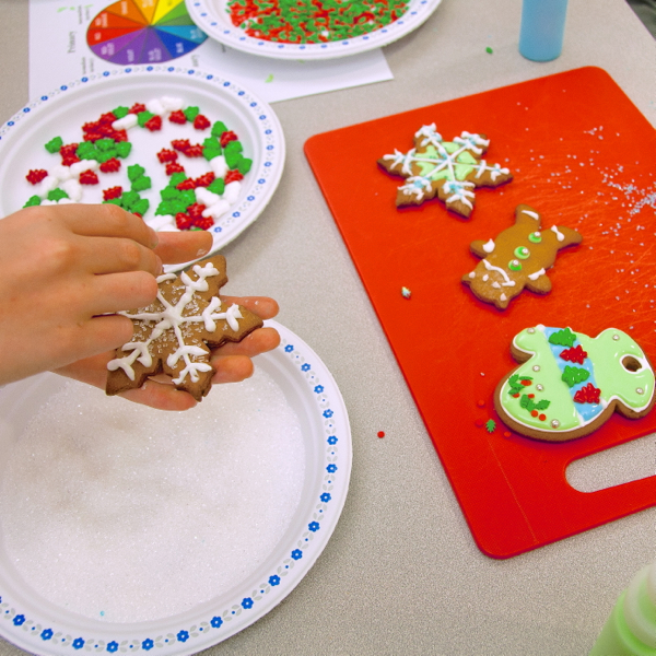 Kids decorating cookies for the holidays with Adell Shneer on eatlivetravelwrite.com