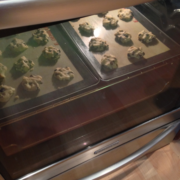 Chocolate chip cookies baking in the KitchenAid oven on eatlivetravelwrite.com