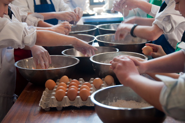 KIds cracking eggs on eatlivetravelwrite.com