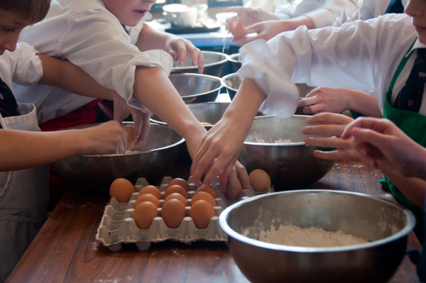 KIds cracking eggs 3 on eatlivetravelwrite.com