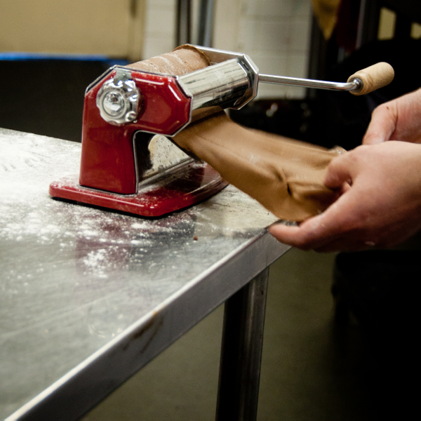 Rolling out chocolate pasta dough with Chef Dave Arseneau on eatlivetravelwrite.com