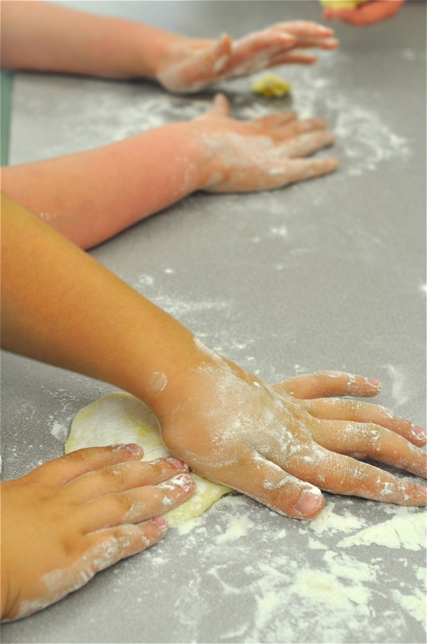 Kids making Empanada dough on eatlivetravelwite.com