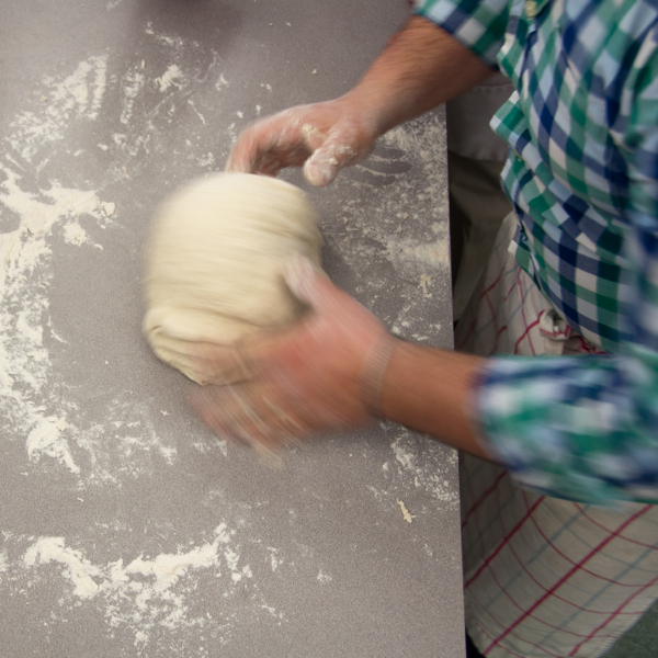 Massimo Bruno kneading pizza dough on eatlivetravelwrite.com