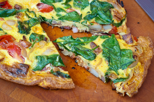 Breakfast frittata slice on eatlivetravelwrite.com