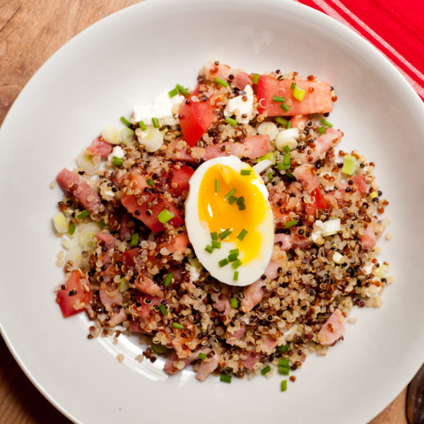 Quinoa breakfast bowl with egg and bacon on eatlivetravelwrite.com