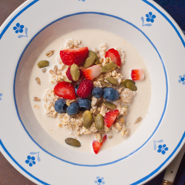 Peanut butter overnight thick cut oats with berries and seeds on eatlivetravelwrite.com