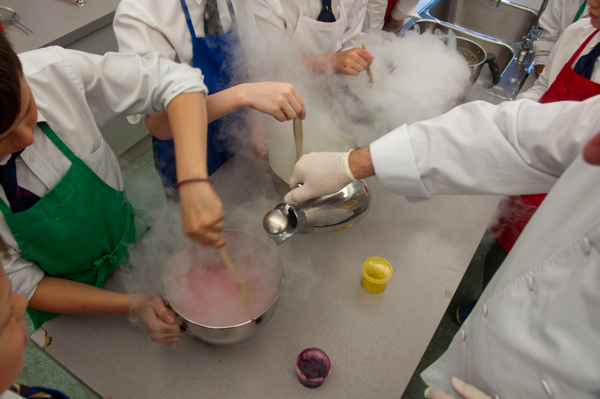 Kids mixing liquid nitrogen ice cream on eatlivetravelwrite.com