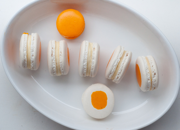 Egg macarons with cream cheese lemon curd filling on eatlivetravelwrite.com