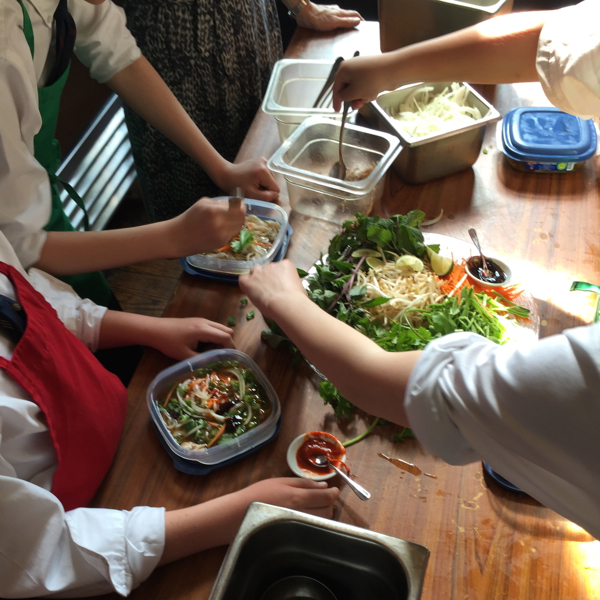 KIds assembling Pho soup at The Gallery Grill on eatlivetravelwrite.com