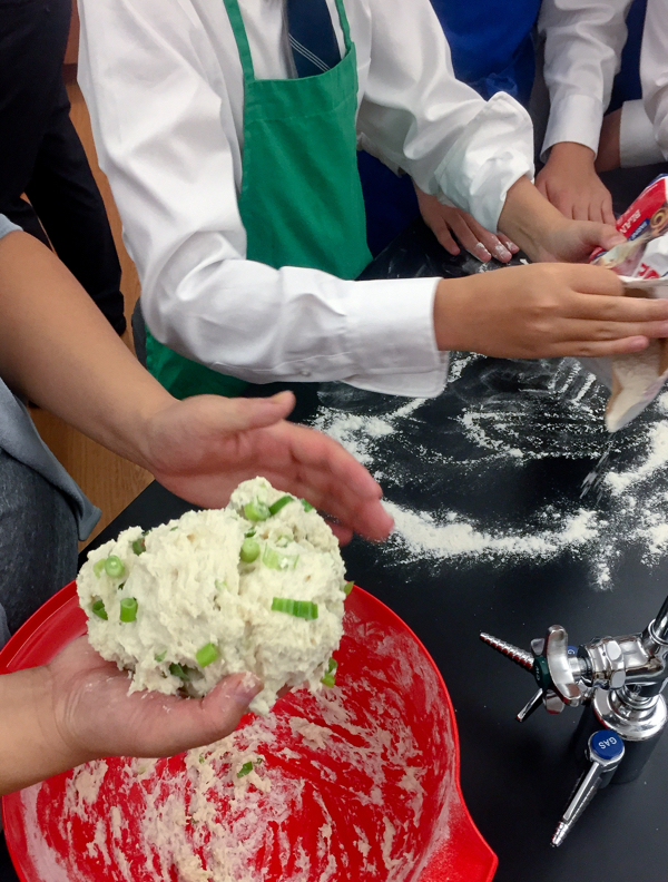 Flouring the counter to roll out scallion pancakes on eatlivetravelwrite.com
