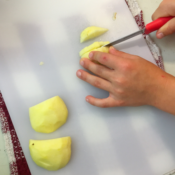 Kids dicing apples on eatlivetravelwrite.com