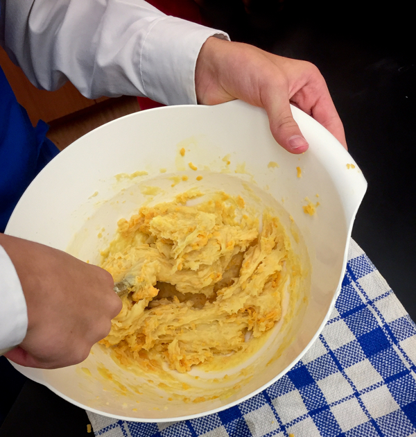 Adding cheese to pate a choux on eatlivetravelwrite.com