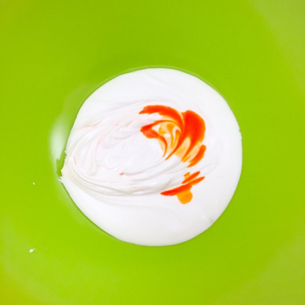 Mixing icing colours for decorating cookies on eatlivetravelwrite.com