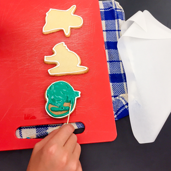 Kids decorating sugar cookies on eatlivetravelwrite.com