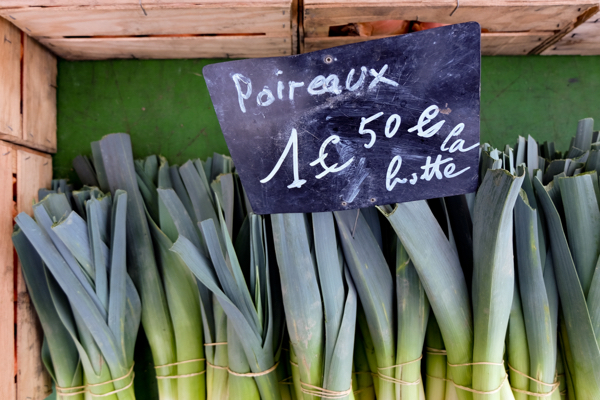 Poireaux at the market in Lyon image on eatlivetravelwrite.com
