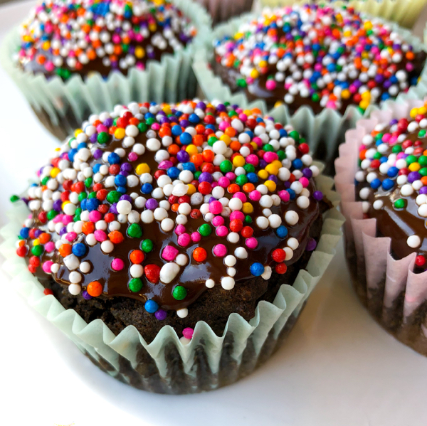 Gluten free double chocolate cupcakes with chocolate ganache and sprinkles recipe on eatlivetravelwrite.com