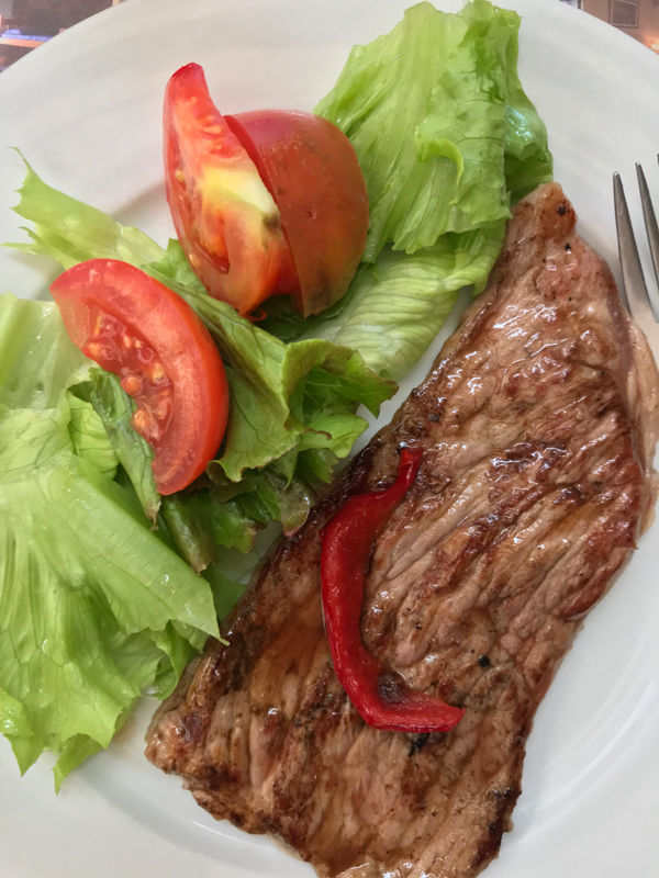 Steak dinner walking the Camino de Santiago: O Cebreiro to Triacastela with Camino Travel Center on eatlivetravelwrite.com