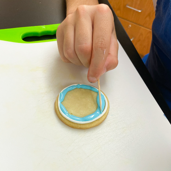 Careful work when decorating sugar cookies with Adell Shneer on eatlivetravelwrite.com