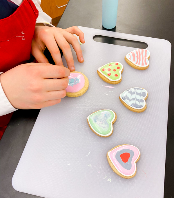 Finishing up decorating sugar cookies with Adell Shneer on eatalivetravelwrite.com