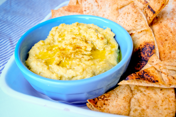 Avocado hummus with crispy oven-baked pita chips