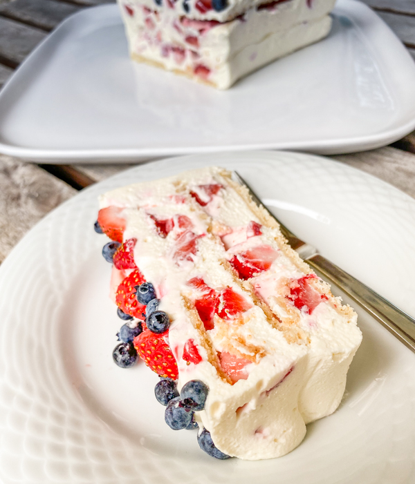 Slice of No-Bake Strawberry Cheesecake Icebox Cake on a plate