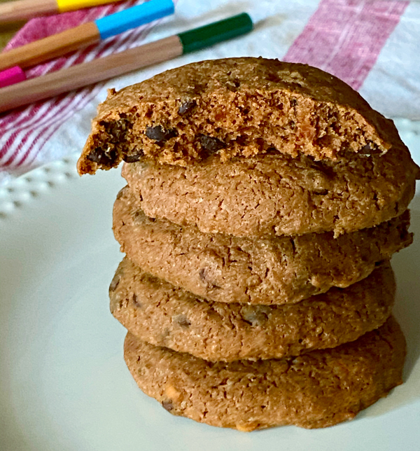Peanut Brownie Sablés from Dorie's Cookies on a plate in front of pencils.