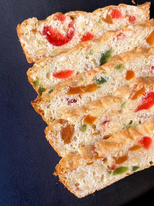 Closeup slices of almond and fruit bread.