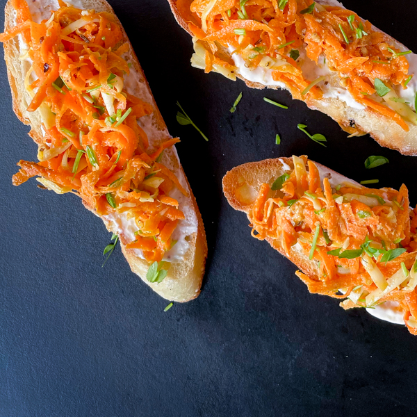 Carrot and Mustard "Rillettes" on a black serving tray.