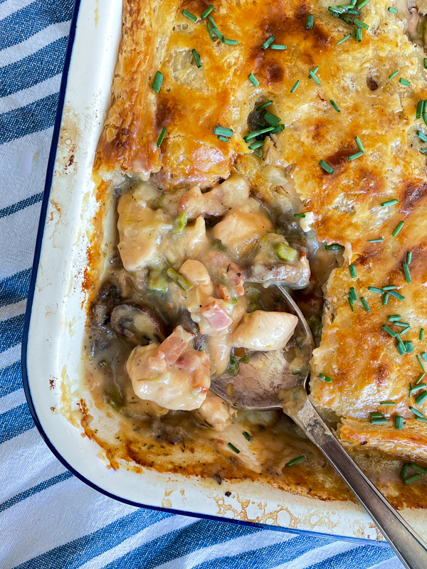 Interior of Chicken pot pie with mushrooms, bacon and asparagus.
