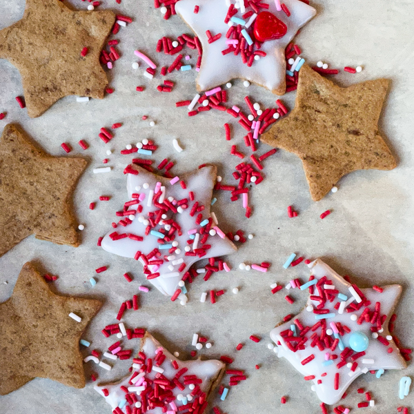 Coffee Anise Stars a baking tray lined with parchment paper.