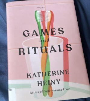 Games and rituals by Katherine Heiny against a dark blue background.