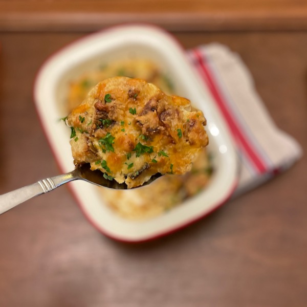 A scoop of Dorie Greenspan's Savoury Bread Pudding.