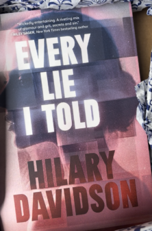 Front cover of a thriller titled 'Every Lie I Told' by Hilary Davidson, with bold white lettering set against a pink/purple background.