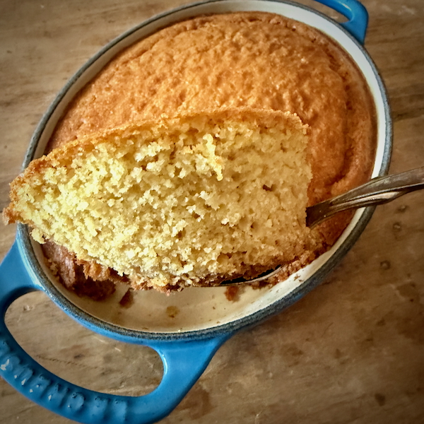 Cross section of Dorie Greenspan's "corn toasties" from Dorie's Anytime Cakes baked into a large cornbread.