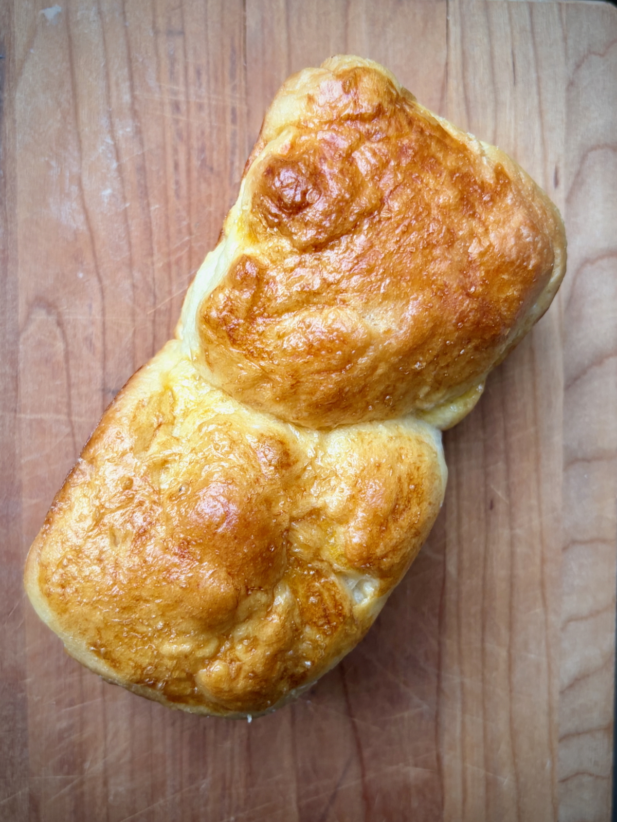 Overhead view of mini brioche loaf.