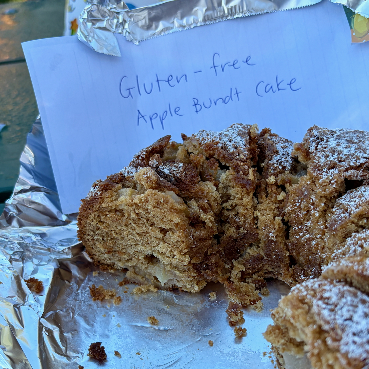 Dorie Greenspan's First-of-Fall Apple Bundt sliced with a label to identify it.